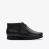 Botas Wallabee para niños: modelo Wallabee de cuero negro para los más mayores