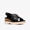 Cuñas de cuero negro Diaz Cross para mujer