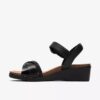 Cuñas de cuero negro Kacha Twist para mujer Cuñas de cuero negro Kacha Twist para mujer