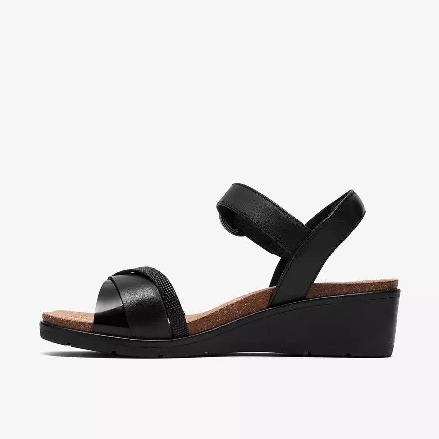 Cuñas de cuero negro Kacha Twist para mujer Cuñas de cuero negro Kacha Twist para mujer