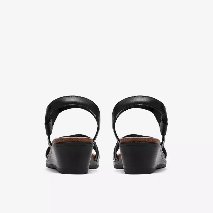 Cuñas de cuero negro Kacha Twist para mujer Cuñas de cuero negro Kacha Twist para mujer