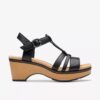 Cuñas de cuero negro Seannah Madi para mujer Cuñas de cuero negro Seannah Madi para mujer