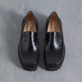 Mocasines Yukoner Penny de cuero negro para hombre