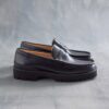 Mocasines Yukoner Penny de cuero negro para hombre Mocasines Yukoner Penny de cuero negro para hombre