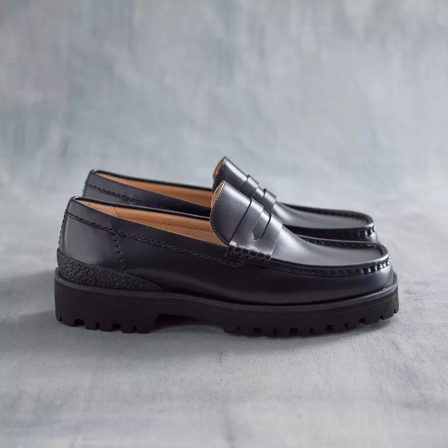 Mocasines Yukoner Penny de cuero negro para hombre Mocasines Yukoner Penny de cuero negro para hombre