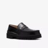 Mocasines Yukoner Penny de cuero negro para hombre Mocasines Yukoner Penny de cuero negro para hombre