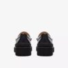 Mocasines Yukoner Penny de cuero negro para hombre Mocasines Yukoner Penny de cuero negro para hombre