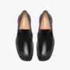 Mocasines Yukoner Penny de cuero negro para hombre Mocasines Yukoner Penny de cuero negro para hombre
