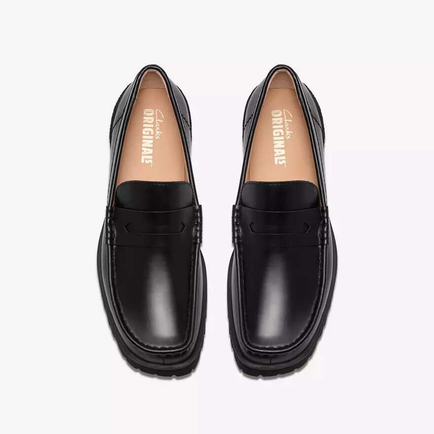 Mocasines Yukoner Penny de cuero negro para hombre Mocasines Yukoner Penny de cuero negro para hombre
