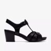 Sandalias de tacón Kymber Glow de cuero negro para mujer