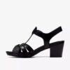 Sandalias de tacón Kymber Glow de cuero negro para mujer
