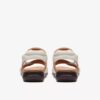 Sandalias planas de piel en color blanco roto «Kitly Ave» para mujer Sandalias planas de piel en color blanco roto «Kitly Ave» para mujer