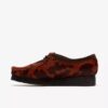 Wallabee para mujer. Wallabees marrones con estampado de vaca Wallabee para mujer. Wallabees marrones con estampado de vaca