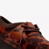 Wallabee para mujer. Wallabees marrones con estampado de vaca Wallabee para mujer. Wallabees marrones con estampado de vaca