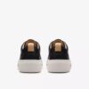 Zapatillas de paseo de cuero negro Hollyhock para mujer Zapatillas de paseo de cuero negro Hollyhock para mujer