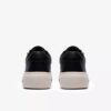 Zapatillas Hollyrose Zip de cuero negro para mujer Zapatillas Hollyrose Zip de cuero negro para mujer