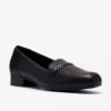 Zapatillas slip-on de cuero negro Juliet Mia para mujer Zapatillas slip-on de cuero negro Juliet Mia para mujer