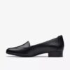 Zapatillas slip-on de cuero negro Krystine Lily para mujer Zapatillas slip-on de cuero negro Krystine Lily para mujer