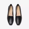Zapatillas slip-on de cuero negro Krystine Lily para mujer Zapatillas slip-on de cuero negro Krystine Lily para mujer