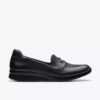 Zapatillas slip-on Ellowyn Penny de cuero negro para mujer Zapatillas slip-on Ellowyn Penny de cuero negro para mujer