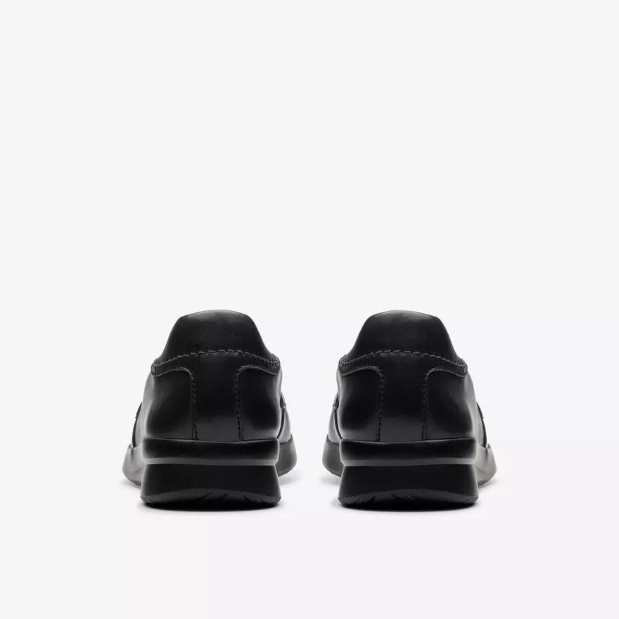 Zapatillas slip-on Ellowyn Penny de cuero negro para mujer Zapatillas slip-on Ellowyn Penny de cuero negro para mujer