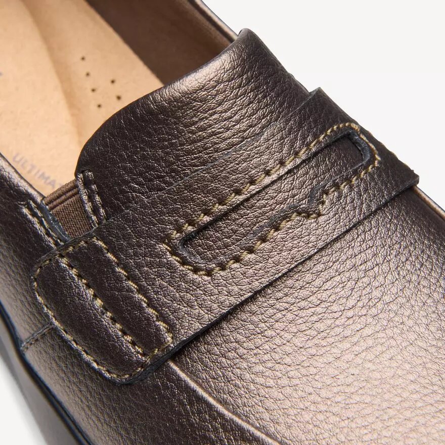 Zapatillas slip-on Ellowyn Penny en bronce metalizado para mujer Zapatillas slip-on Ellowyn Penny en bronce metalizado para mujer