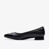 Zapatillas slip-on Natalyn de cuero negro oscuro para mujer Zapatillas slip-on Natalyn de cuero negro oscuro para mujer