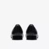 Zapatillas slip-on Natalyn de cuero negro oscuro para mujer Zapatillas slip-on Natalyn de cuero negro oscuro para mujer