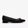 Zapatillas slip-on Natalyn Trim de piel negra para mujer Zapatillas slip-on Natalyn Trim de piel negra para mujer