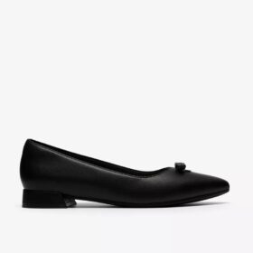 Zapatillas slip-on Natalyn Trim de piel negra para mujer
