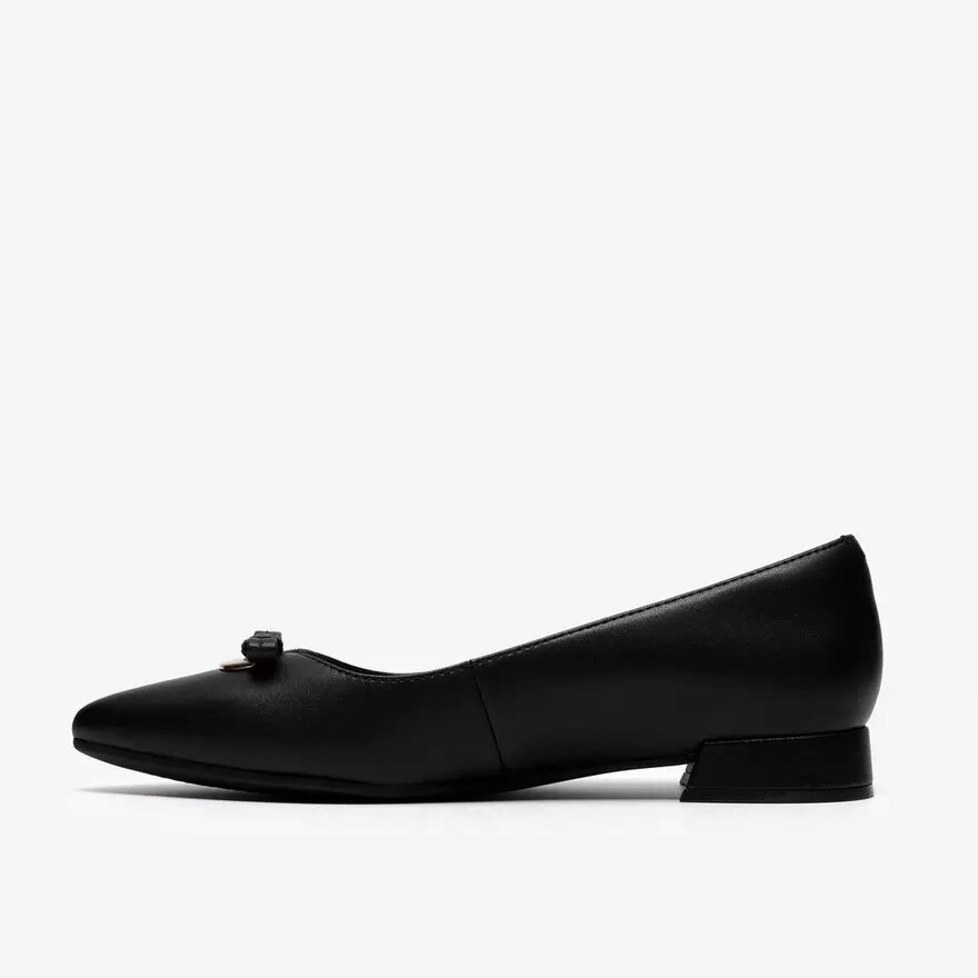 Zapatillas slip-on Natalyn Trim de piel negra para mujer Zapatillas slip-on Natalyn Trim de piel negra para mujer