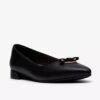 Zapatillas slip-on Natalyn Trim de piel negra para mujer Zapatillas slip-on Natalyn Trim de piel negra para mujer