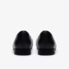 Zapatillas slip-on Natalyn Trim de piel negra para mujer Zapatillas slip-on Natalyn Trim de piel negra para mujer