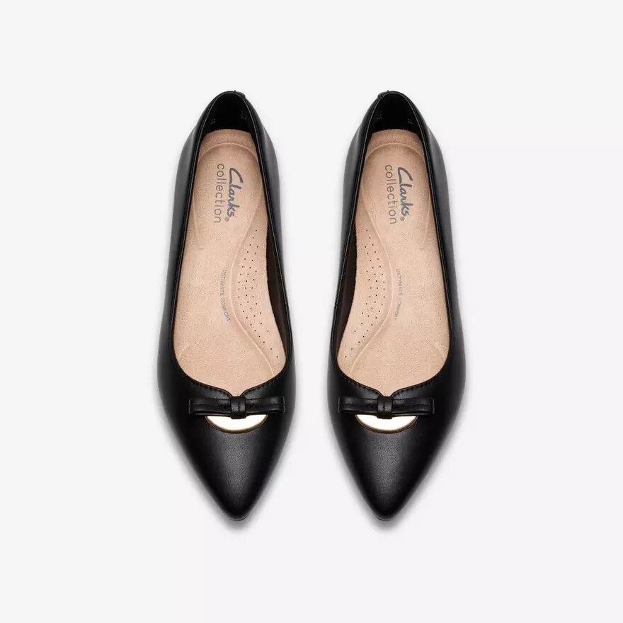 Zapatillas slip-on Natalyn Trim de piel negra para mujer Zapatillas slip-on Natalyn Trim de piel negra para mujer