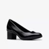 Zapatos de salón Shaya Poppy negros de charol para mujer Zapatos de salón Shaya Poppy negros de charol para mujer